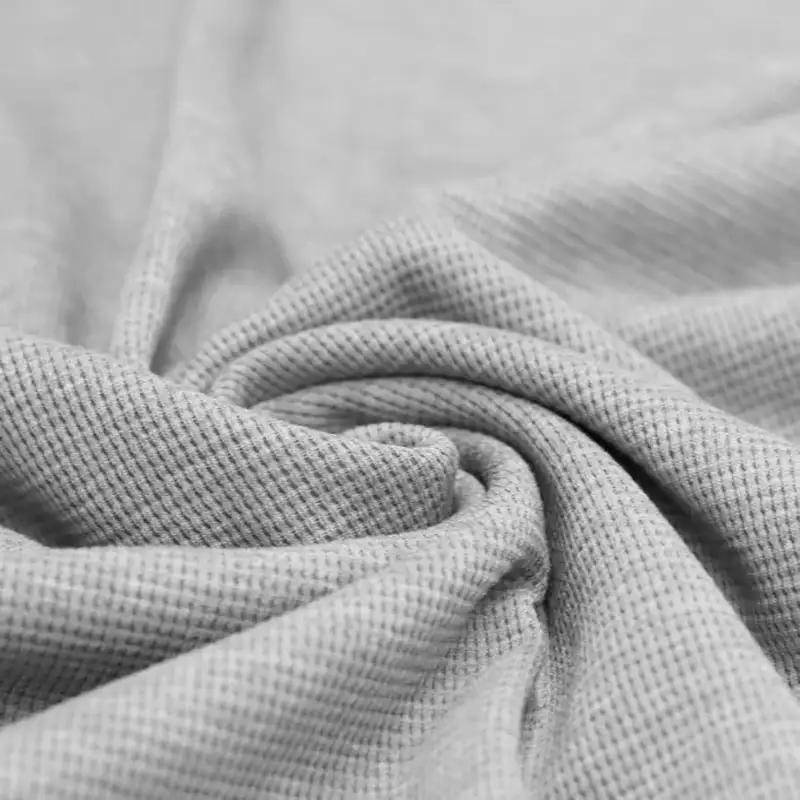 Waffelstrick-Jersey-Stoff Hellgrau Melange ideal zum Nähen für Baby- und Kinderkleidung.